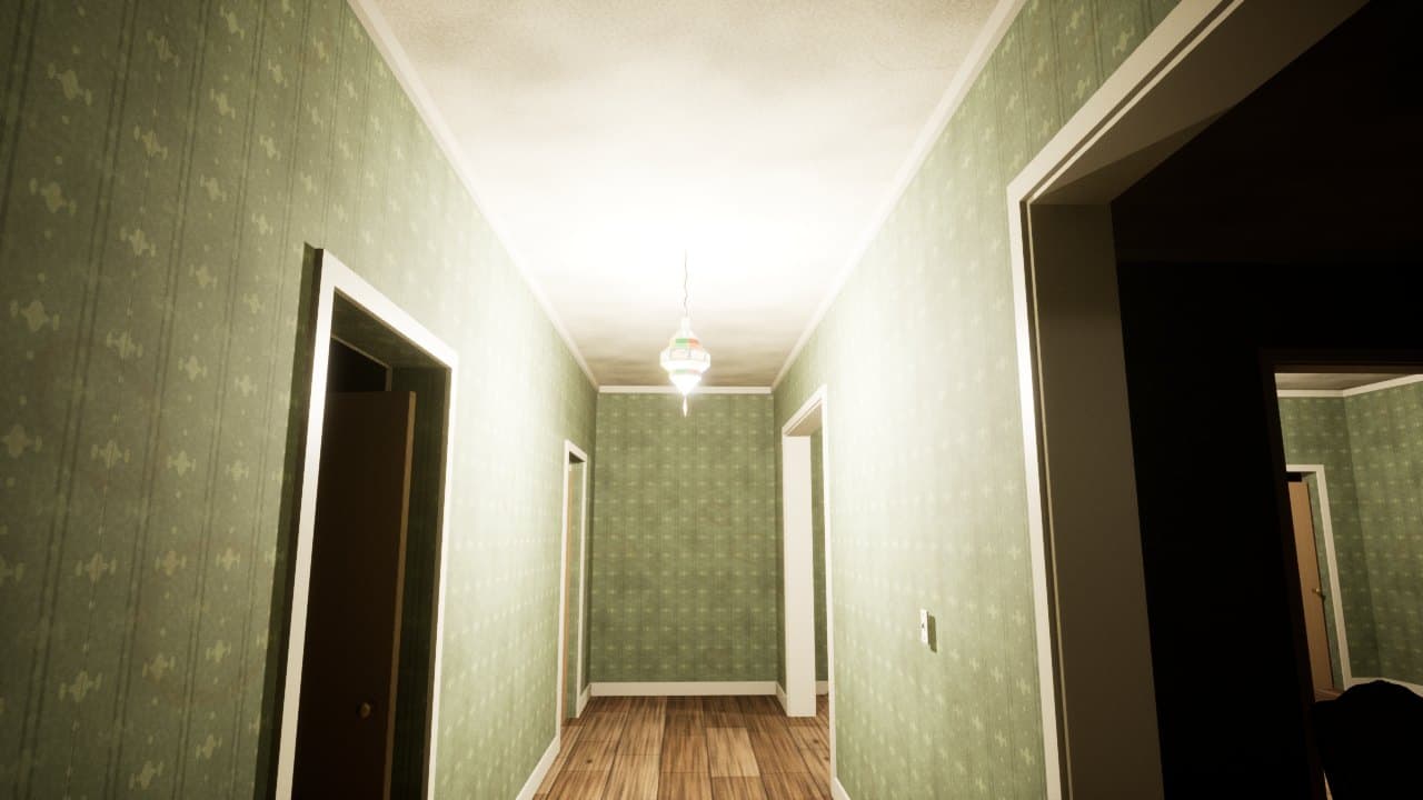 Hallway with green wallpaper under a hanging lamp