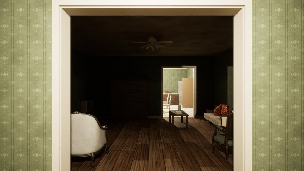 Looking from the entrance into the dark living room, past an armchair and sofa